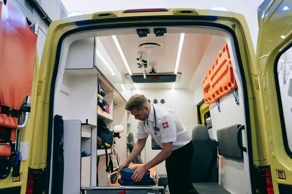 Technician organizing repair tools inside a mobile service van
